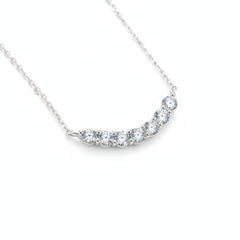 925 sterling silver moissanite necklace close-up of curved stone row on chain