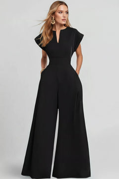 Black plus size jumpsuit with notched V-neck, wide-leg trousers, short sleeves.