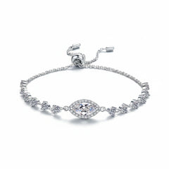 Sterling silver moissanite bracelet with central oval halo and small multicolor stones