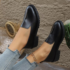 Black round-toe block heel loafers with side V seam and rugged outsole