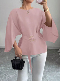 Blush pink batwing-sleeve belted blouse with square waist buckle detail