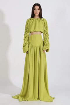 Green ruched long-sleeve crop top and high-waist maxi skirt set, layered skirt hem