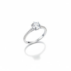 Sterling silver moissanite solitaire ring, round center stone on pavé shank