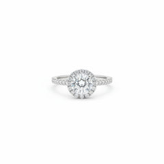 Sterling silver ring with round halo moissanite solitaire and pavé band shoulders