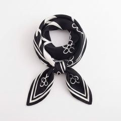 Square flower silk scarf in black and white with floral and swirl motif