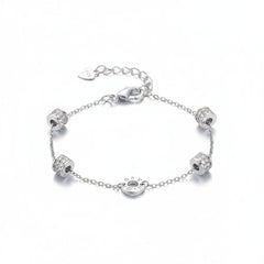 925 sterling silver chain bracelet with round end discs, cylindrical charms, and clasp