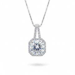 Silver moissanite pendant with cushion center stone and pavé prong frame on chain