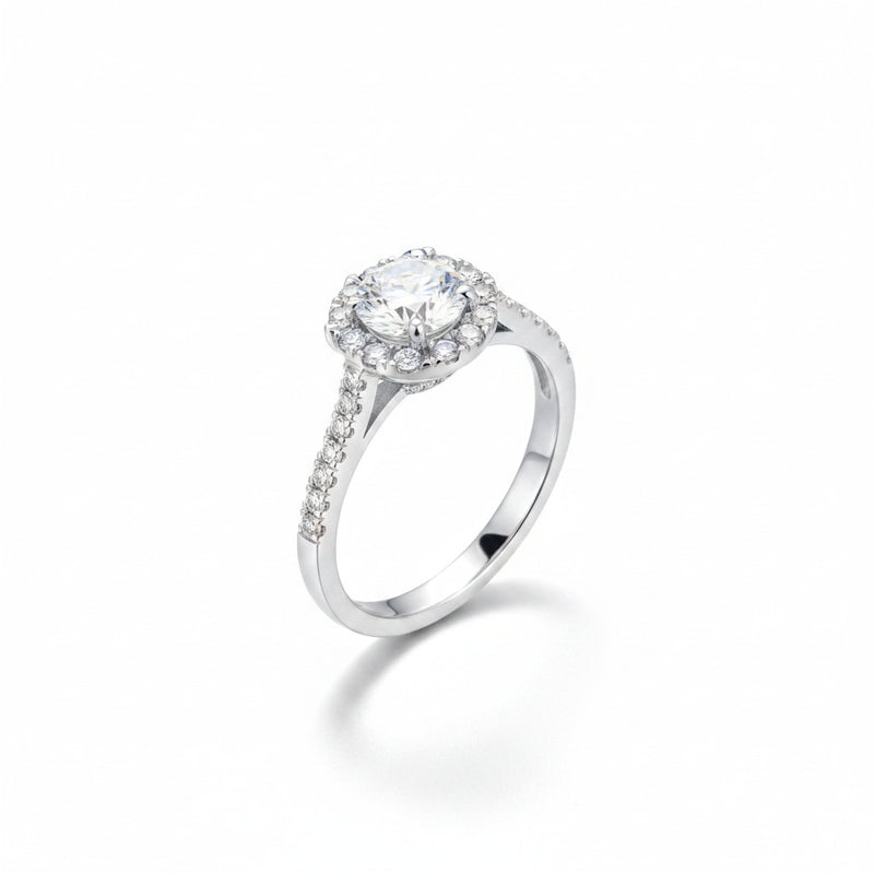 Sterling silver moissanite solitaire ring with halo pavé band