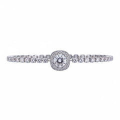 Silver moissanite tennis bracelet with round center stone and pavé detail band