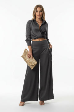 Black long-sleeve shirt and wide-leg pants set with wrap-style top
