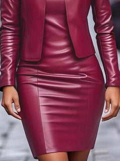 Burgundy leather jacket and fitted dress set close-up, skirt and pocket details