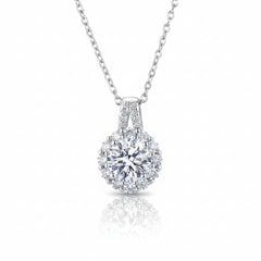 Sterling silver moissanite pendant necklace featuring a round halo and faceted center