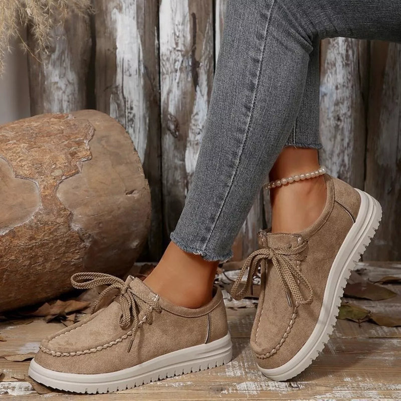 Brown suede lace-up loafers with round toe and white chunky sole