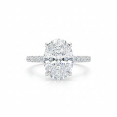 Oval solitaire sterling silver ring with prong-set center and sparkle pavé band