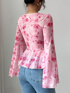 Floral chiffon blouse peplum with round neck, back view, pink with red rose print