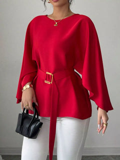 Red batwing-sleeve belted blouse with square buckle waist detail
