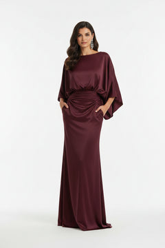 Burgundy batwing sleeve ruched maxi dress with twisted waist detail and flowing skirt