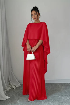 Red pleated maxi dress with cape sleeves and draped shoulder overlay