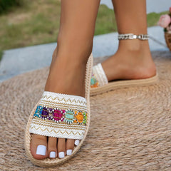 Open toe flat sandals with multicolor jeweled embroidery and rope sole