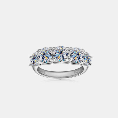 925 sterling silver moissanite band with a row of round clear stones