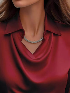 Burgundy satin cowl-neck blouse with V drape and pointed collar