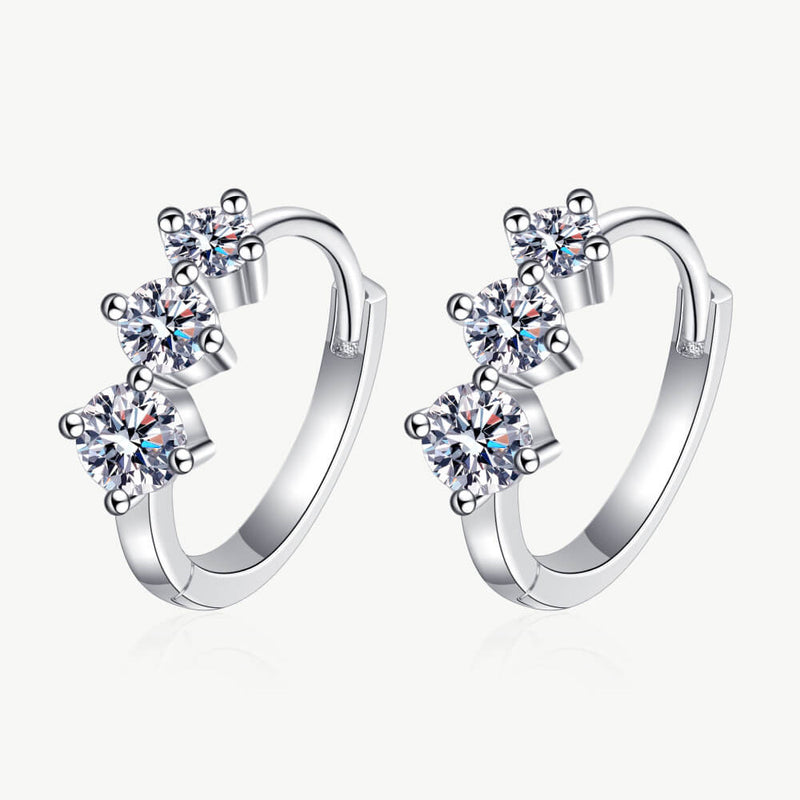 Sterling silver huggie hoop earrings with hinged hoops and three round moissanite stones