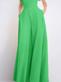 Neon green plus size jumpsuit showing wide-leg pants and notched V-neck.