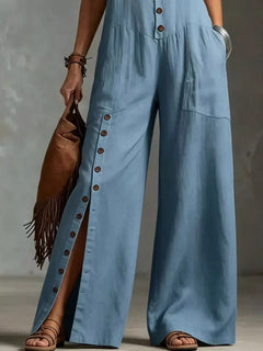 Light blue wide-leg jumpsuit with front buttons and side patch pockets
