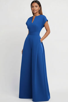 Royal blue plus size jumpsuit with notched V-neck cutout and wide-leg silhouette.