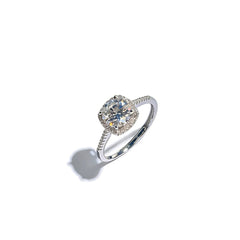 Round halo solitaire ring in sterling silver, front view with center stone