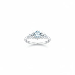 Sterling silver moissanite three-stone ring three-quarter view, round center with side stones