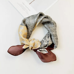 Printed silk square scarf in gray with gold paisley accents and deep burgundy ends