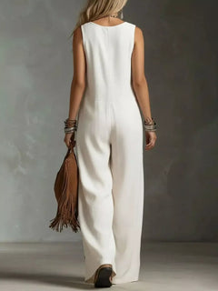 White sleeveless wide-leg jumpsuit with buttonless back and gathered waist