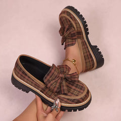 Plaid chunky loafers with front bow and decorative charm, tan plaid upper