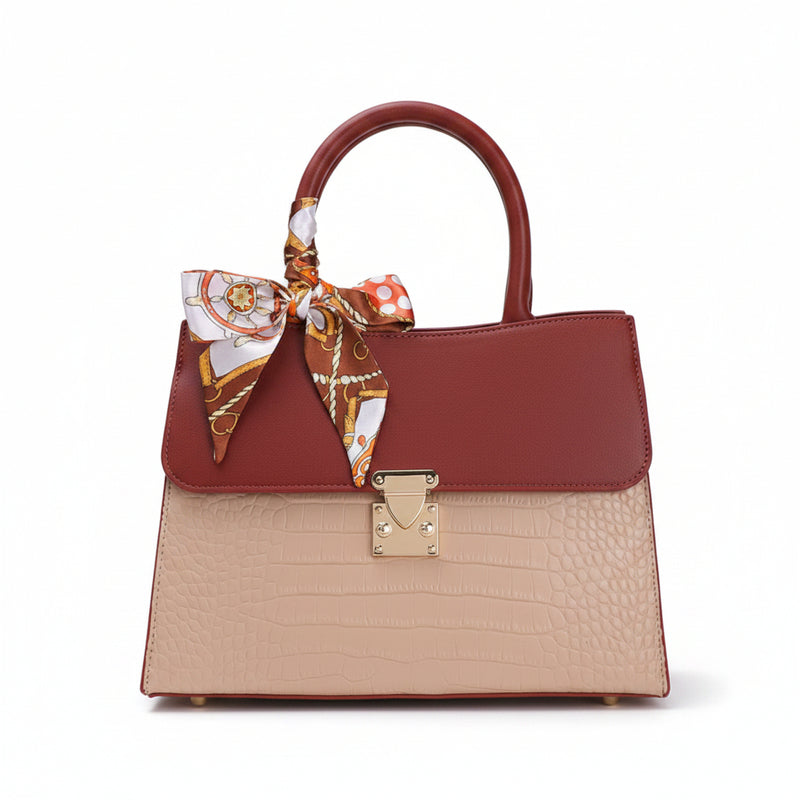 Top-handle handbag, crocodile-embossed; burgundy and beige panels, gold lock, scarf bow
