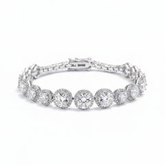 Sterling silver moissanite tennis bracelet with round bezel-set stones and chain links