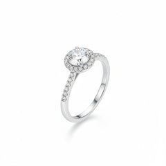 Sterling silver moissanite halo solitaire ring with round center stone and pavé shank