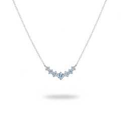 925 sterling silver moissanite necklace with small stones forming a V-shaped line