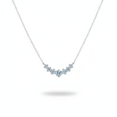 925 sterling silver moissanite necklace with small stones forming a V-shaped line