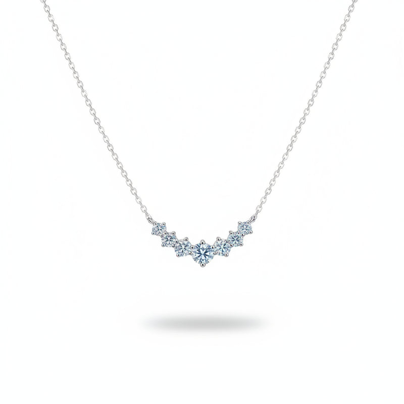 925 sterling silver moissanite necklace with small stones forming a V-shaped line