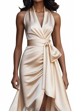 Cream satin maxi dress with V-neck wrap bodice, sash tie, and asymmetrical ruffled hem