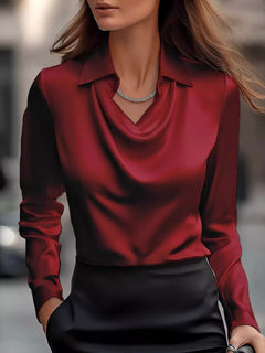 Burgundy satin cowl-neck long-sleeve blouse with pointed collar and V drape