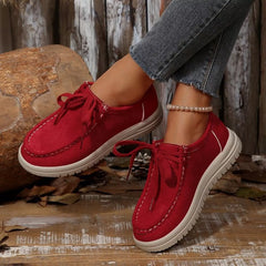 Red suede lace-up loafers with round toe and white chunky sole