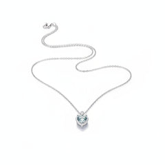 Heart-shaped moissanite pendant necklace in sterling silver with clear heart stone
