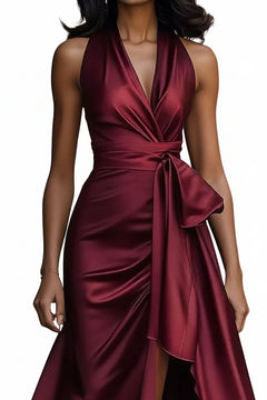 Wine red satin maxi dress with tied waist and draped ruffled high-low skirt