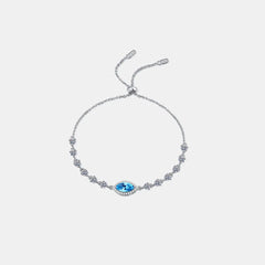 Sterling silver moissanite bracelet with bright blue oval center and white stone chain