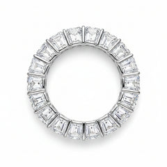 Rhodium-plated silver moissanite band ring with baguette-cut stones, top view.