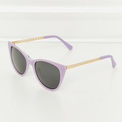 Lavender cat-eye acetate sunglasses with dark lenses and gold-tone temples