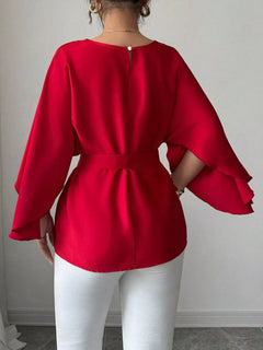 Red back view batwing-sleeve belted blouse with tied waist and flared hem