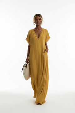 Yellow lace-trim V-neck maxi dress with short sleeves and relaxed draped silhouette
